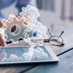 Business process management automation concept using internet technology and ERP (Enterprise Resource Planning) to improve productivity and efficiency, businessman touching computer screen, AR gears
